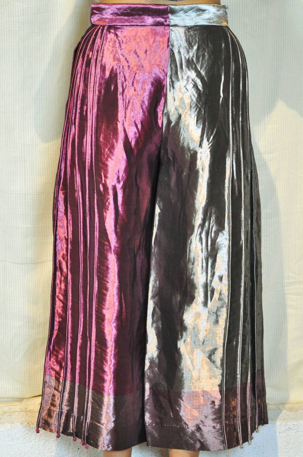 Metallic asymmetric flared trousers